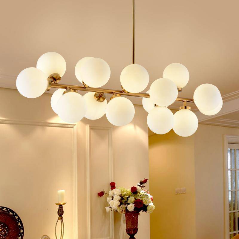 https://cdn.shopify.com/s/files/1/2499/8120/products/lustre-design-a-led-avec-branche-noir-ou-doree-et-boules-en-verre_532bcf39-bc03-44da-a283-4d284473eb19.png?v=1632786361