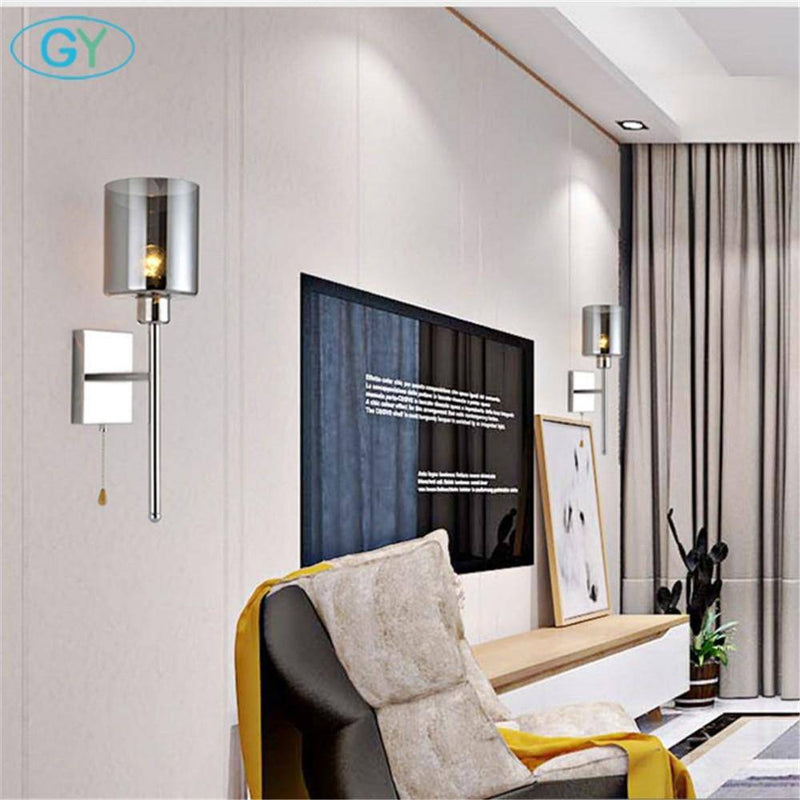 https://cdn.shopify.com/s/files/1/2499/8120/products/applique-murale-design-chromee-a-led-et-abat-jour-cylindrique-en-verre_75e913c7-f771-406c-b26a-7c6d77deb60b.png?v=1632836305