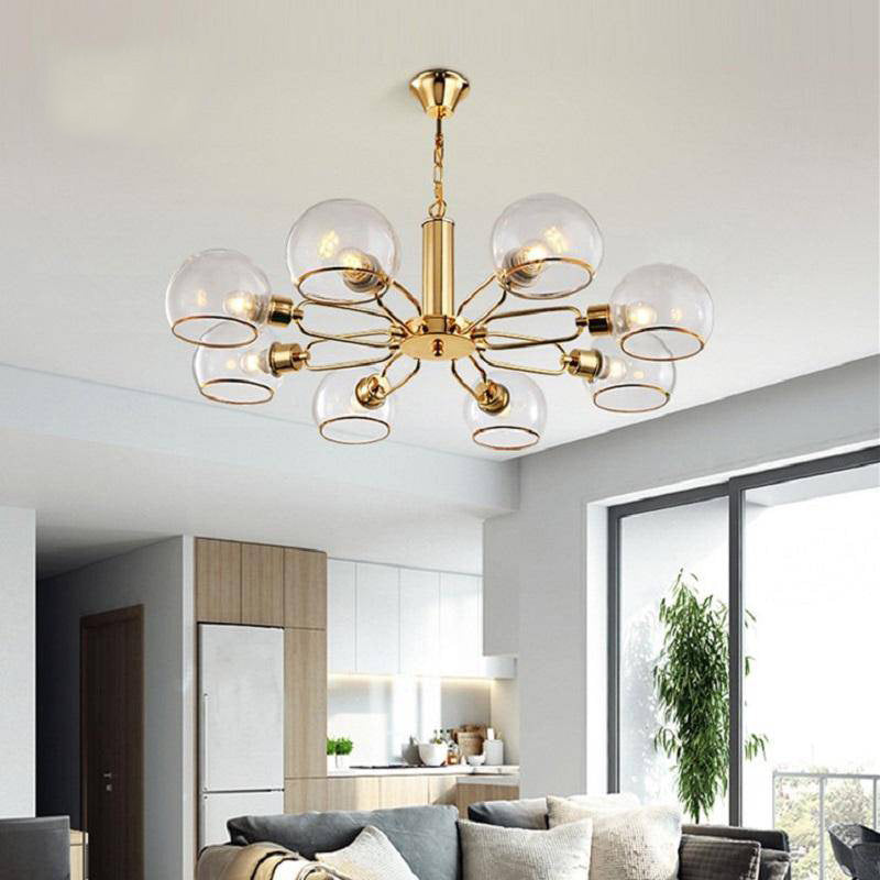 https://cdn.shopify.com/s/files/1/2499/8120/products/lustre-design-moderne-dore-avec-boules-de-verre-glass_4d9c6ab8-031b-4c06-a928-d1305314c77f.jpg?v=1632829389