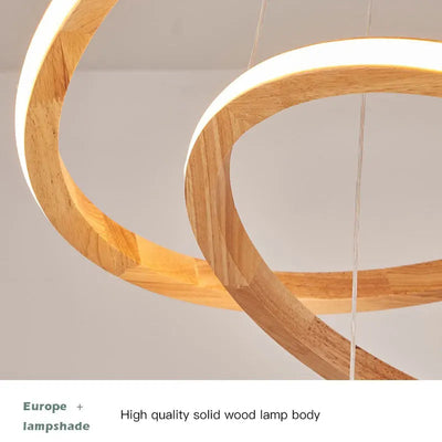 https://cdn.shopify.com/s/files/1/2499/8120/files/suspension-moderne-en-bois-avec-lustre-rond-design-lumineux-5.jpg?v=1725440105